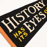 Book with text 'History has its eyes on you' on a white background