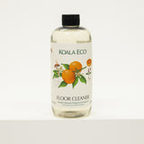Bottle of Koala Eco floor cleaner on a white background