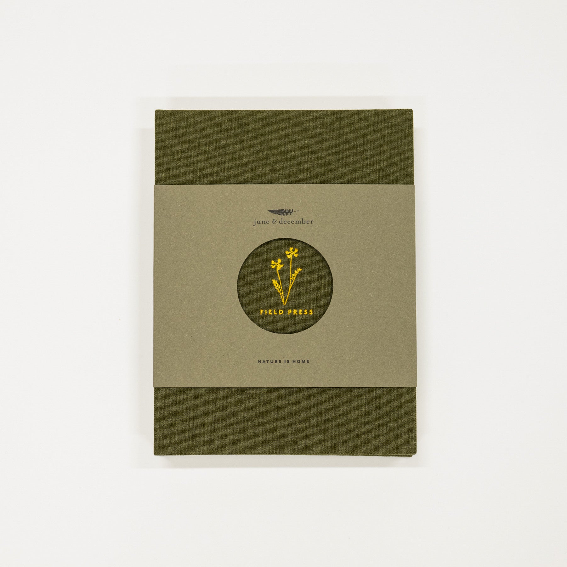 green flower press book with green and beige cover on a white background