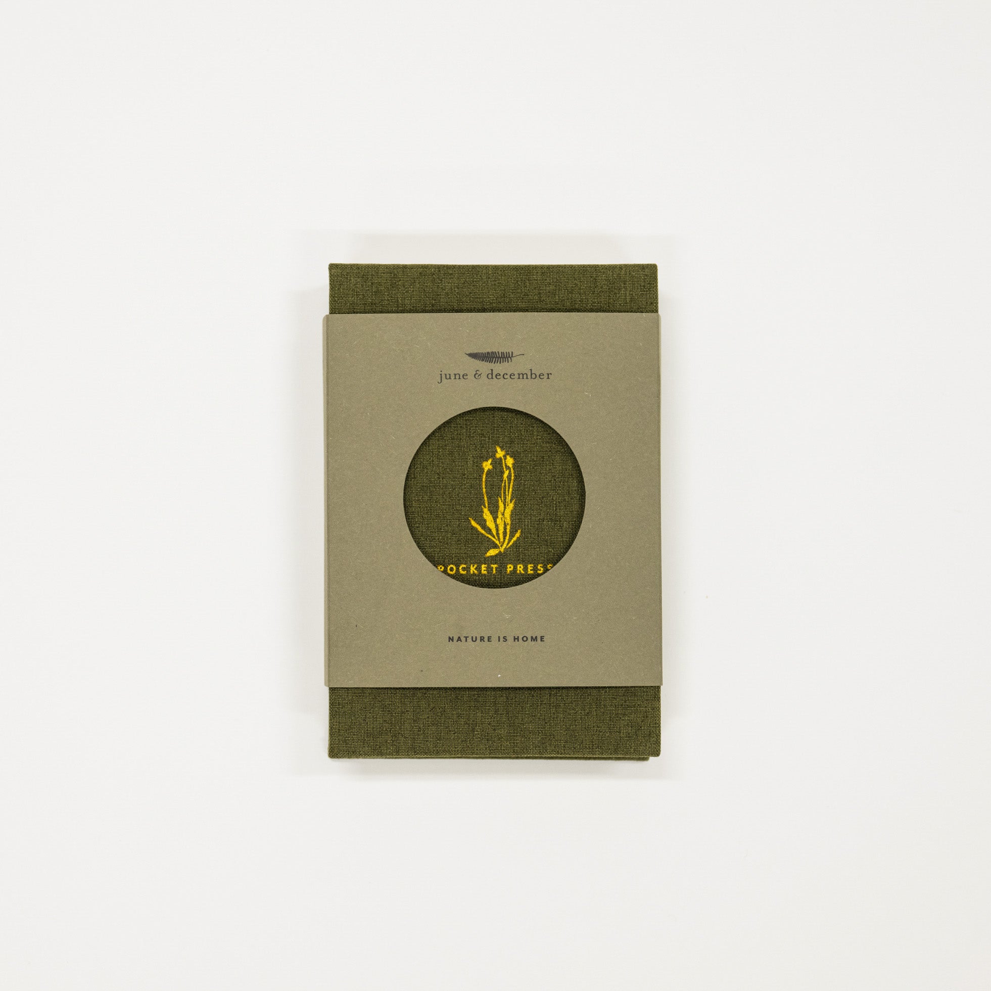 Green flower press book with a circular design and text on a white background