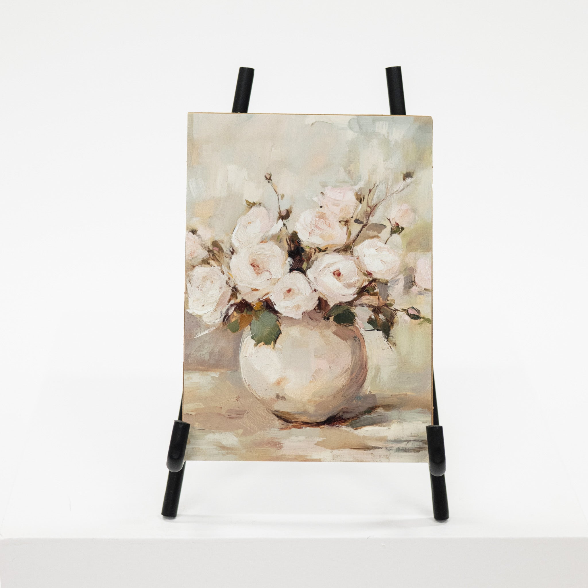 Floral painting on a stand with a white background
