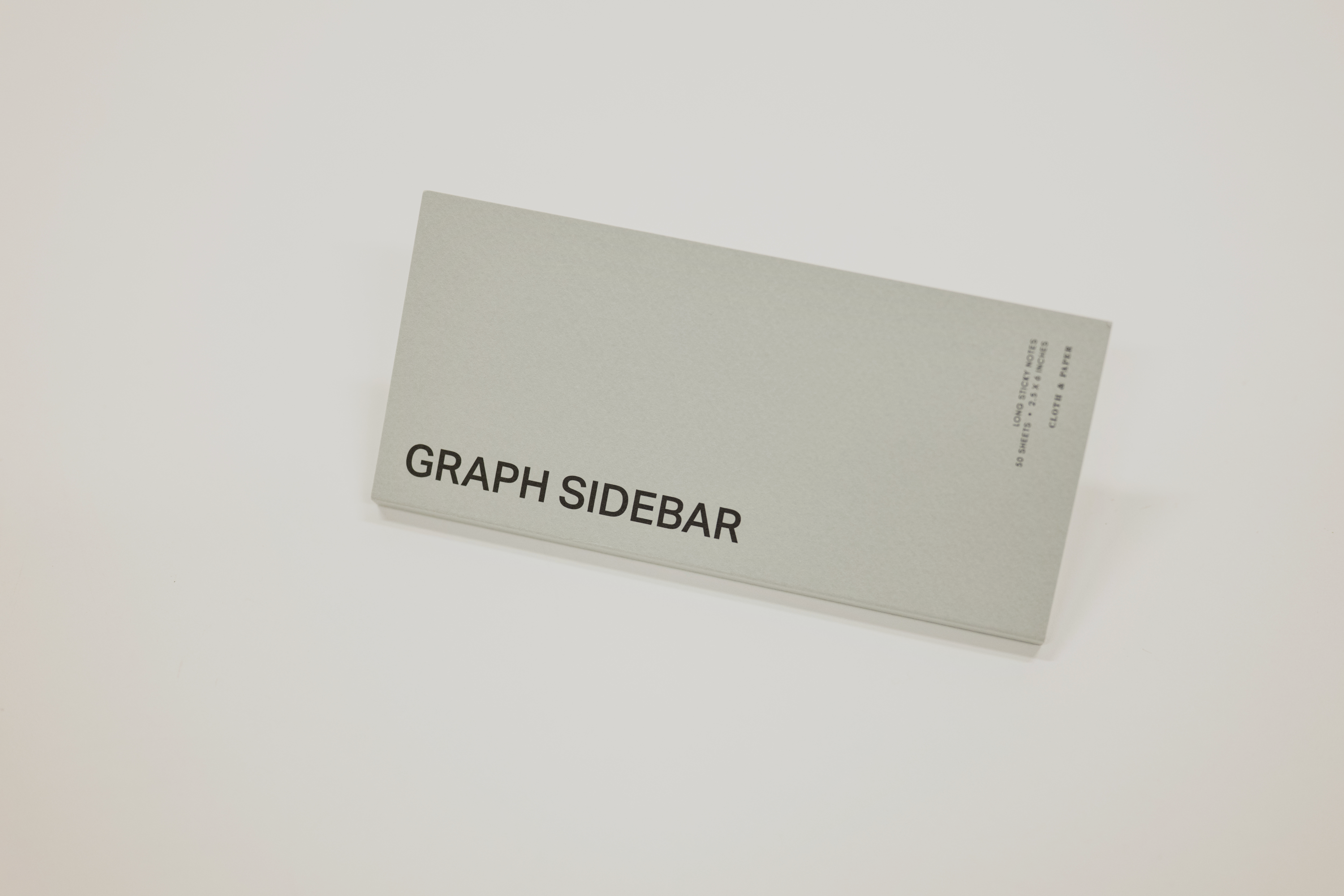 Rectangular gray card with 'GRAPH SIDEBAR' text on a white background