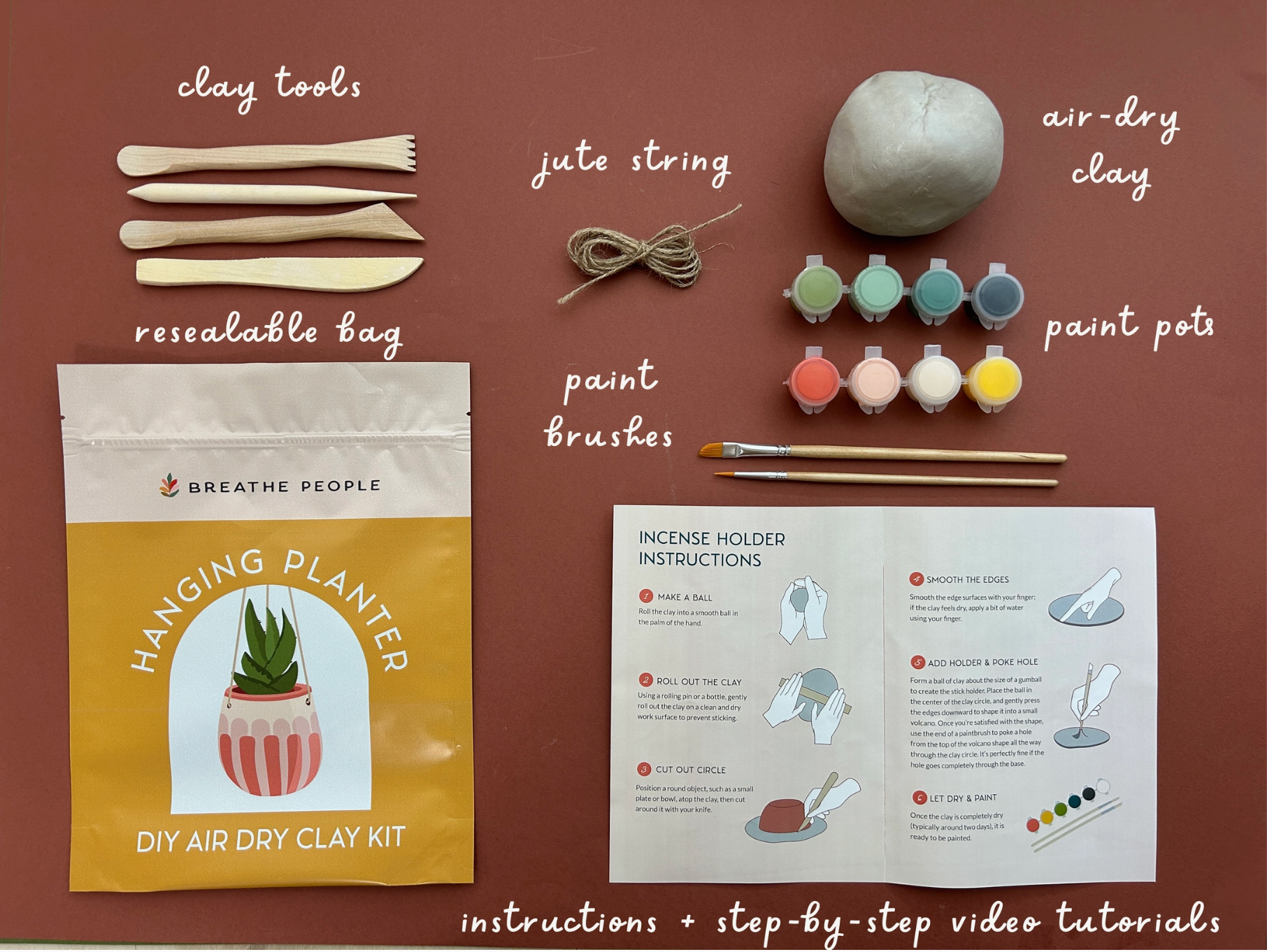DIY air-dry clay kit with tools, paint pots, and instructions on a brown background
