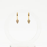 Gold heart-shaped earrings on a white background