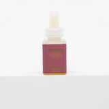 A small rectangular bottle of Moodcast Homebody Relaxing Calm oil with a dusty rose label and gold lettering, set against a plain white background.