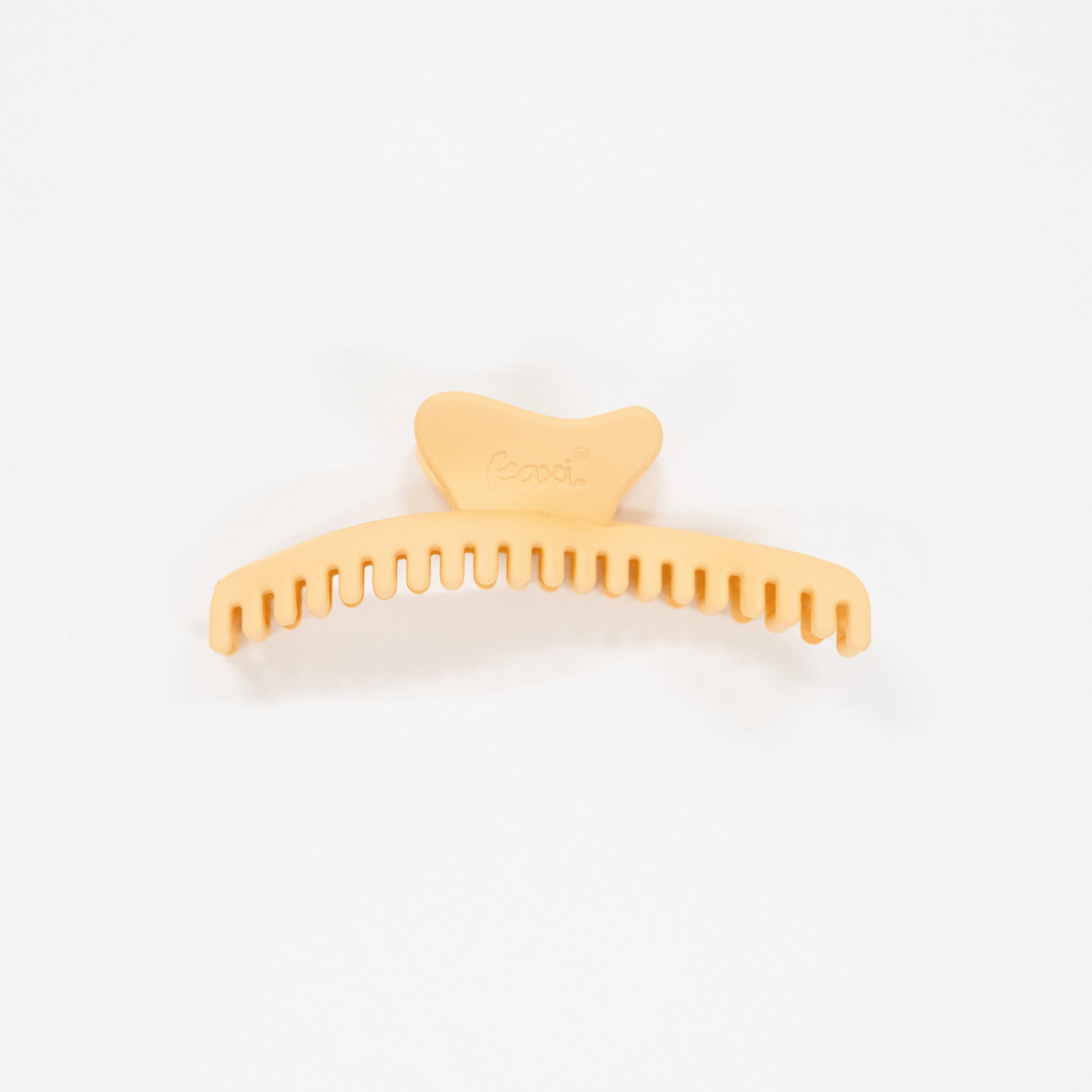 honey orange hair comb on a white background