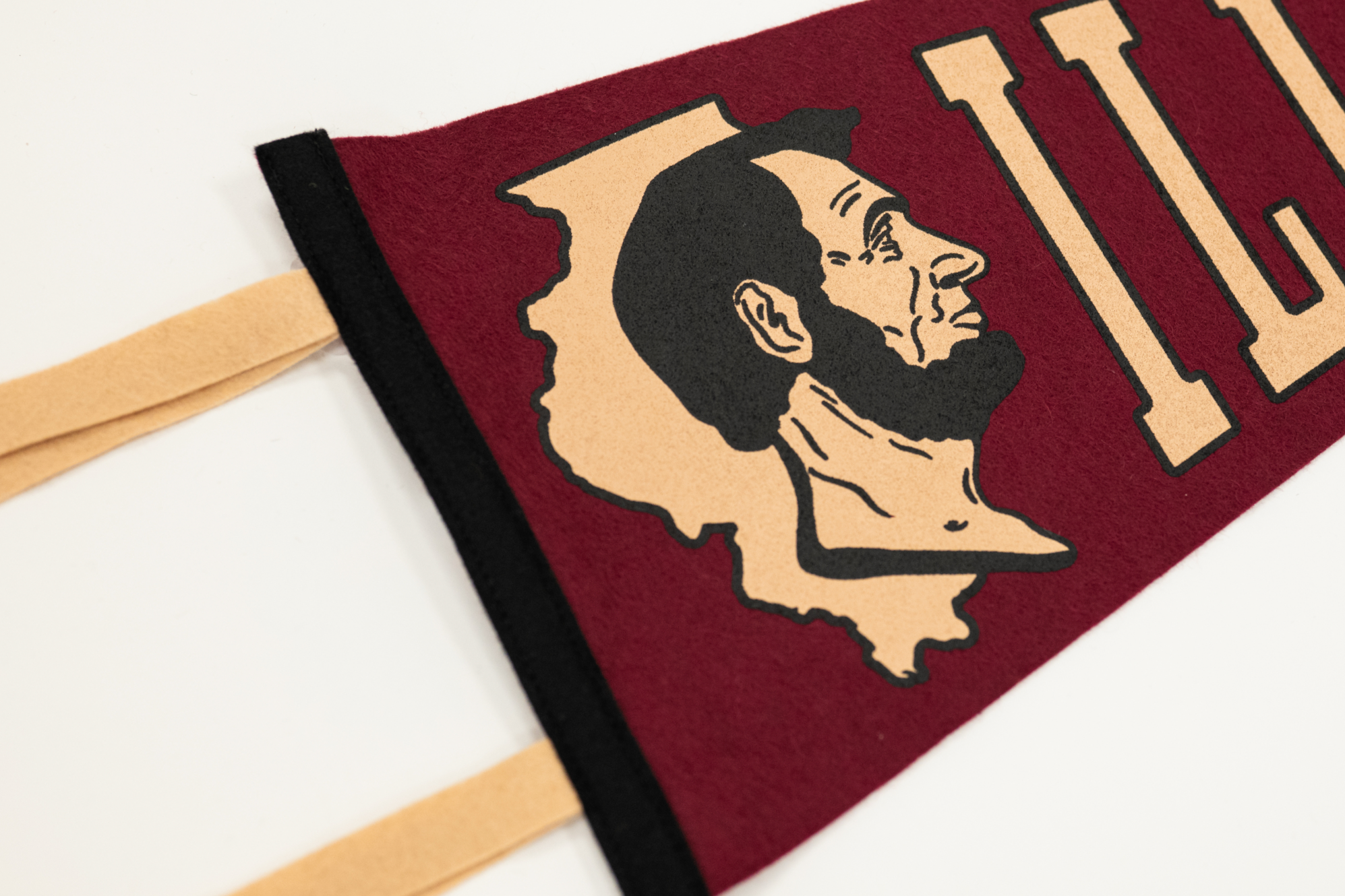 Close-up of a banner with a profile of a person and text on a white background