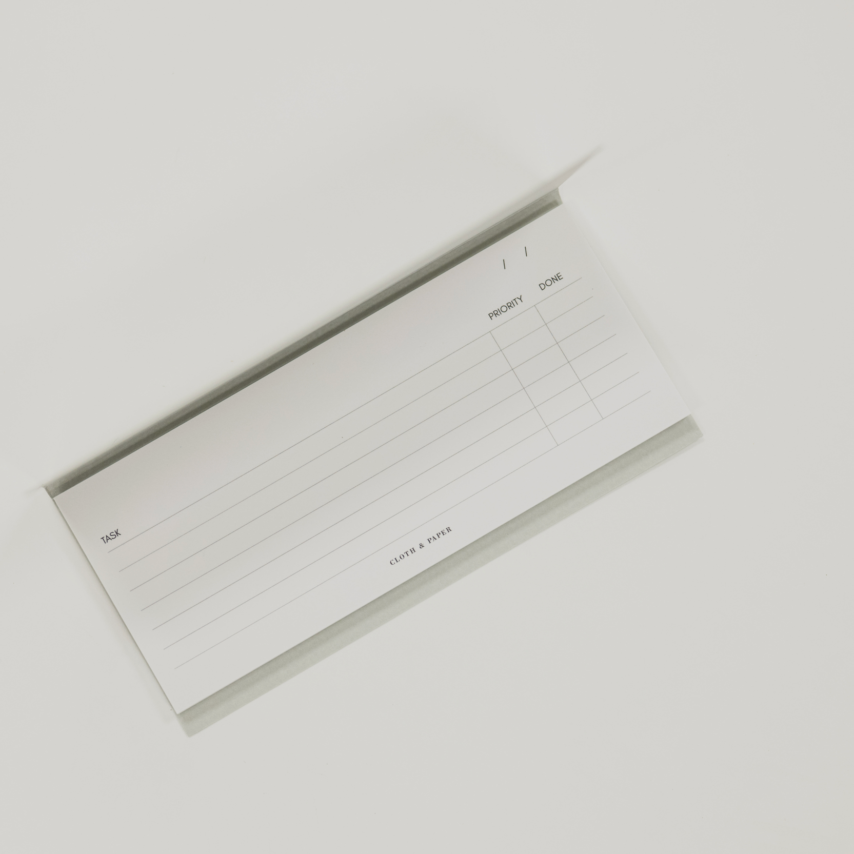 long sticky note pad with task checklist