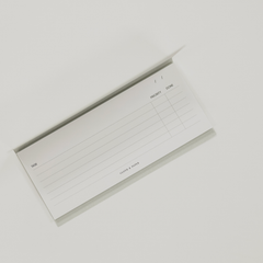 long sticky note pad with task checklist