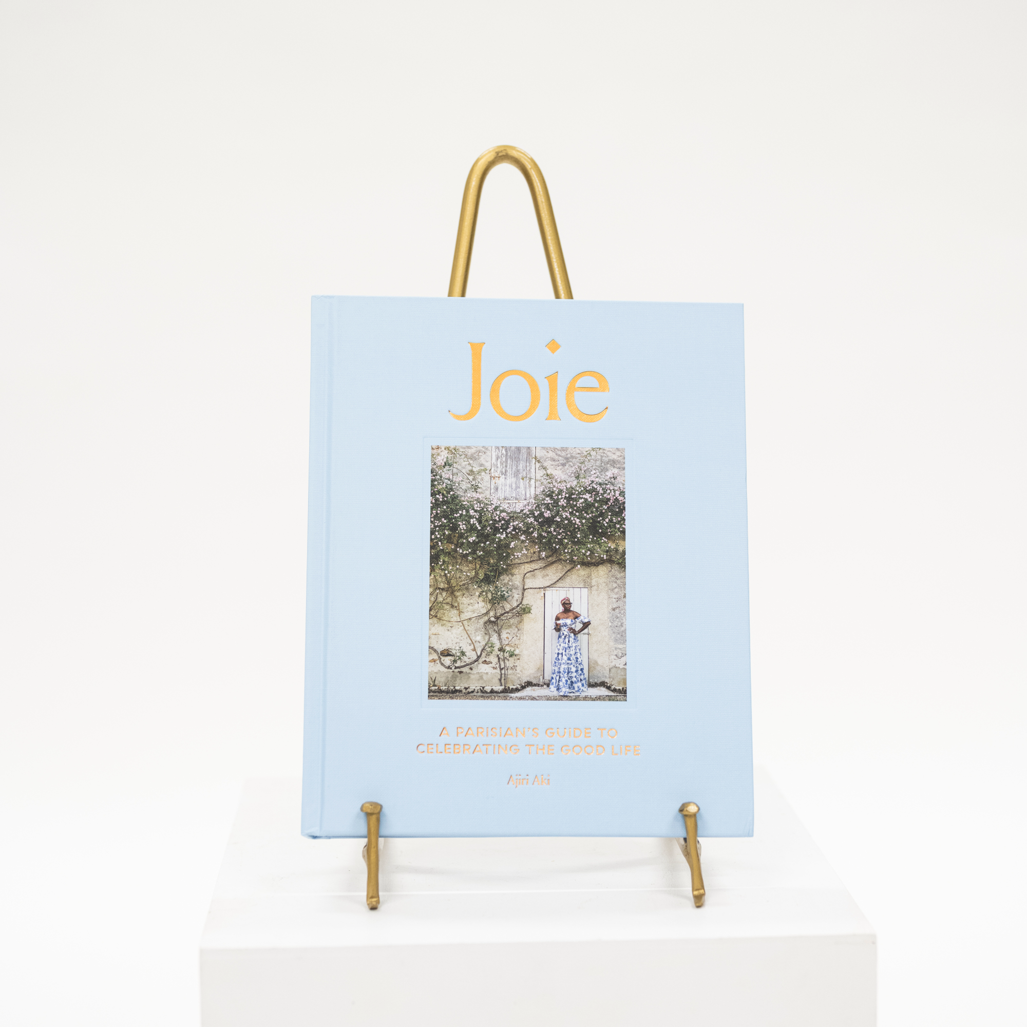 joie blue linen coffee table book about parisian lifestyle