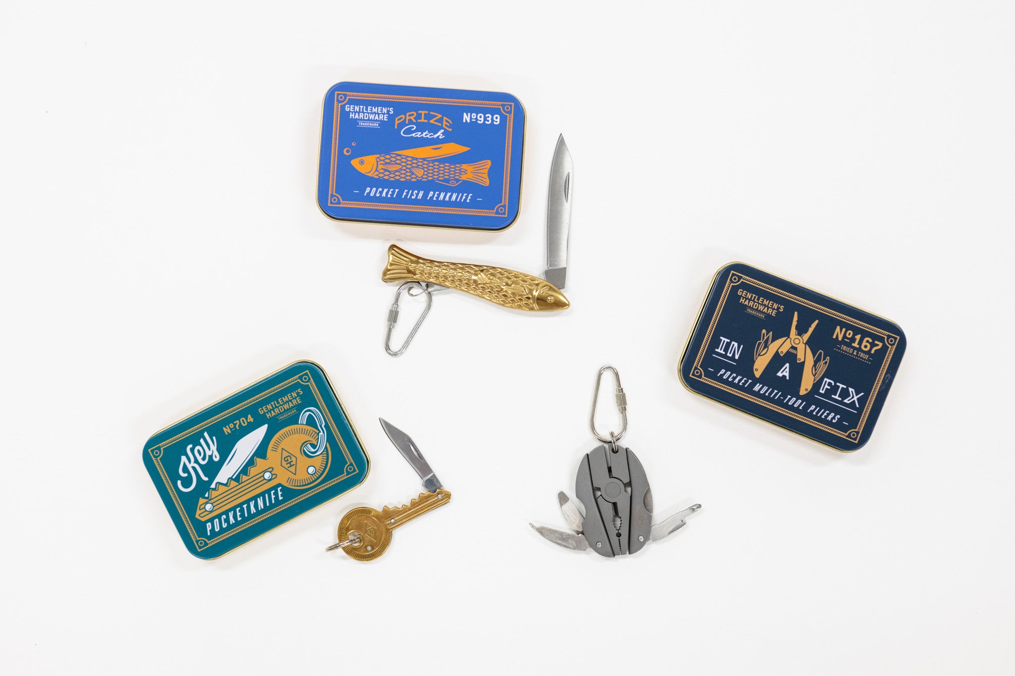 Collection of small tools and keychains on a white background