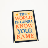Motivational poster with colorful text on a beige background