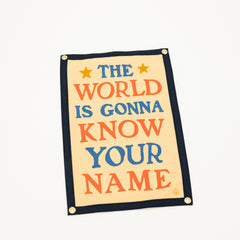 Motivational poster with colorful text on a beige background