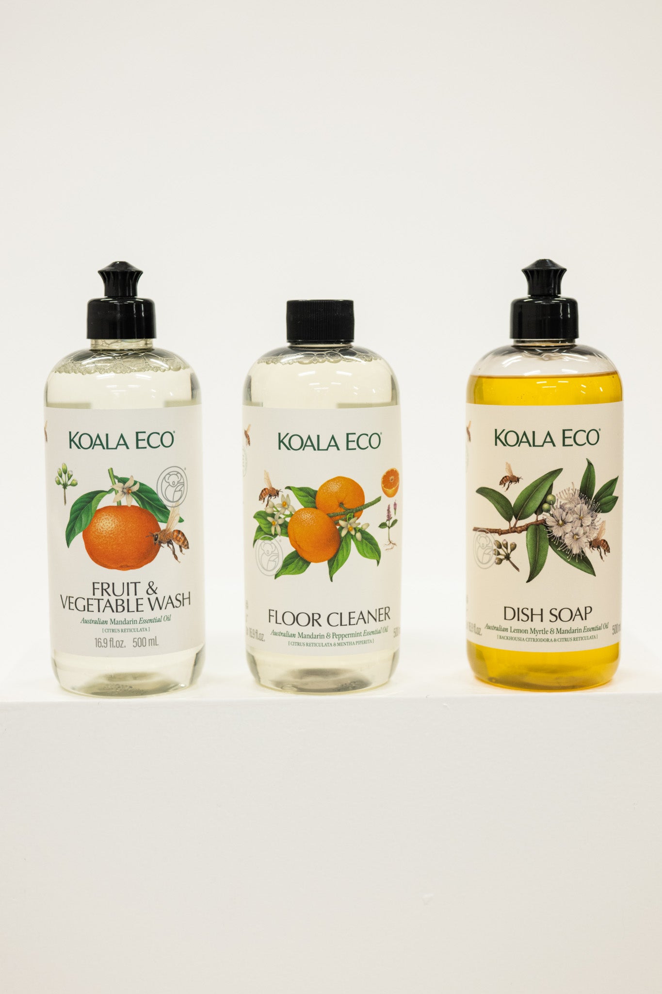 Three bottles of Koala Eco cleaning products on a white surface with a white background