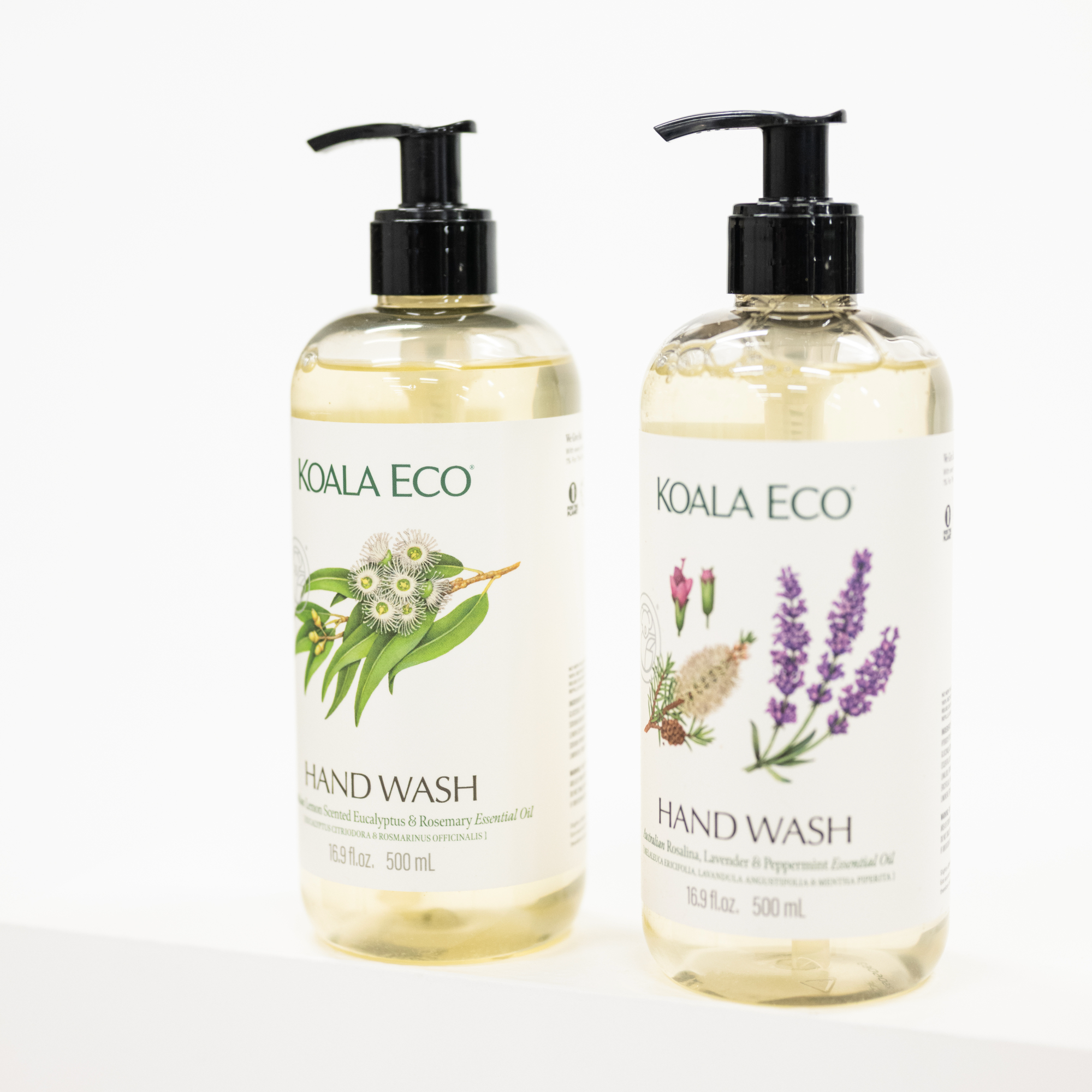 Two 500 mL bottles of KOALA ECO hand wash with pump dispensers, standing side by side on a white surface against a white background. The left bottle is labeled Eucalyptus & Rosemary Essential Oil, and the right bottle is labeled Lavender and Peppermint Essential Oil.