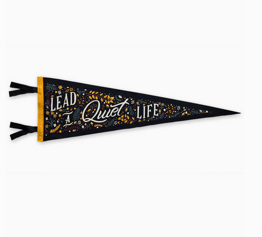 Black pennant with gold text on a white background