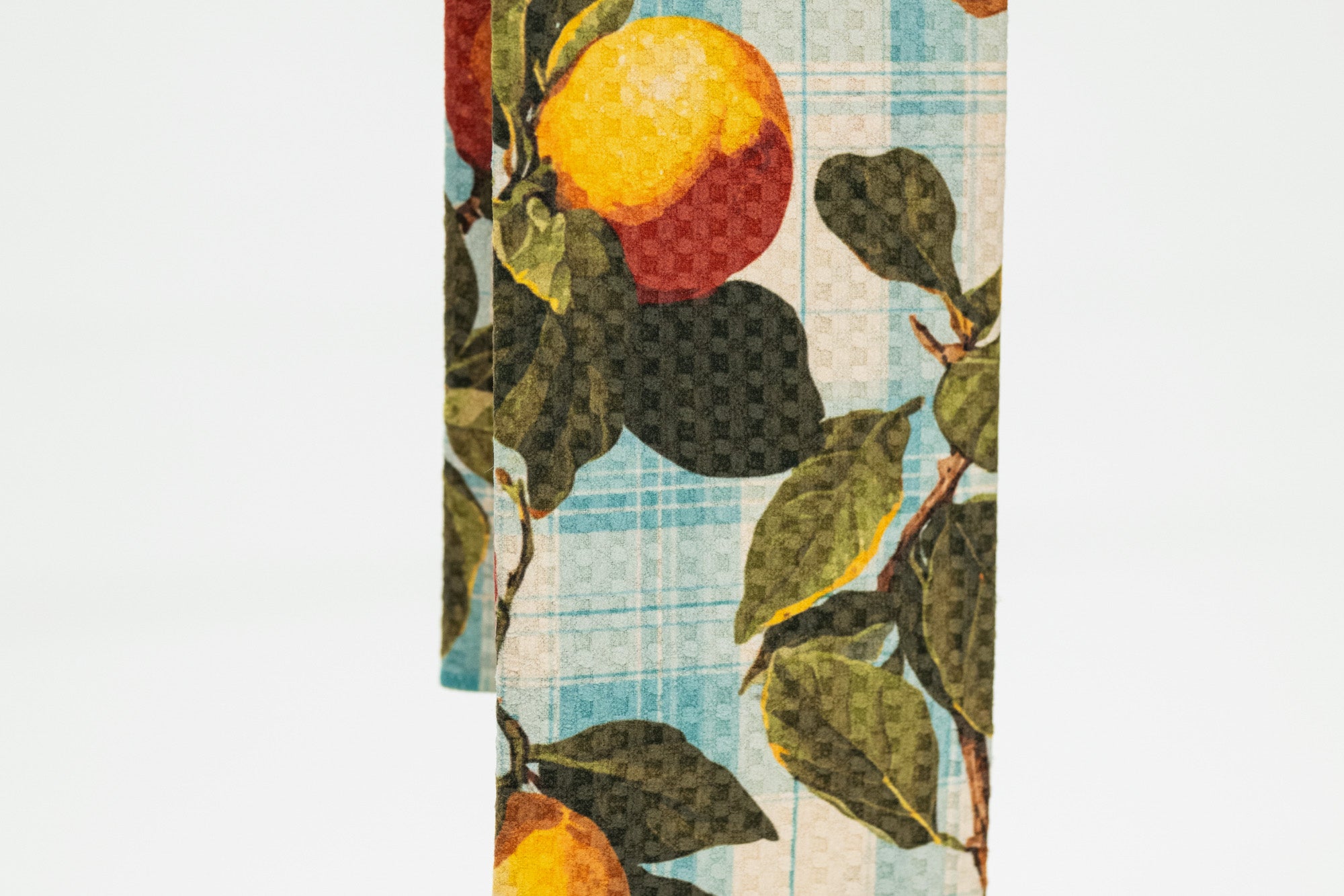 Decorative napkin with fruit design on a white background