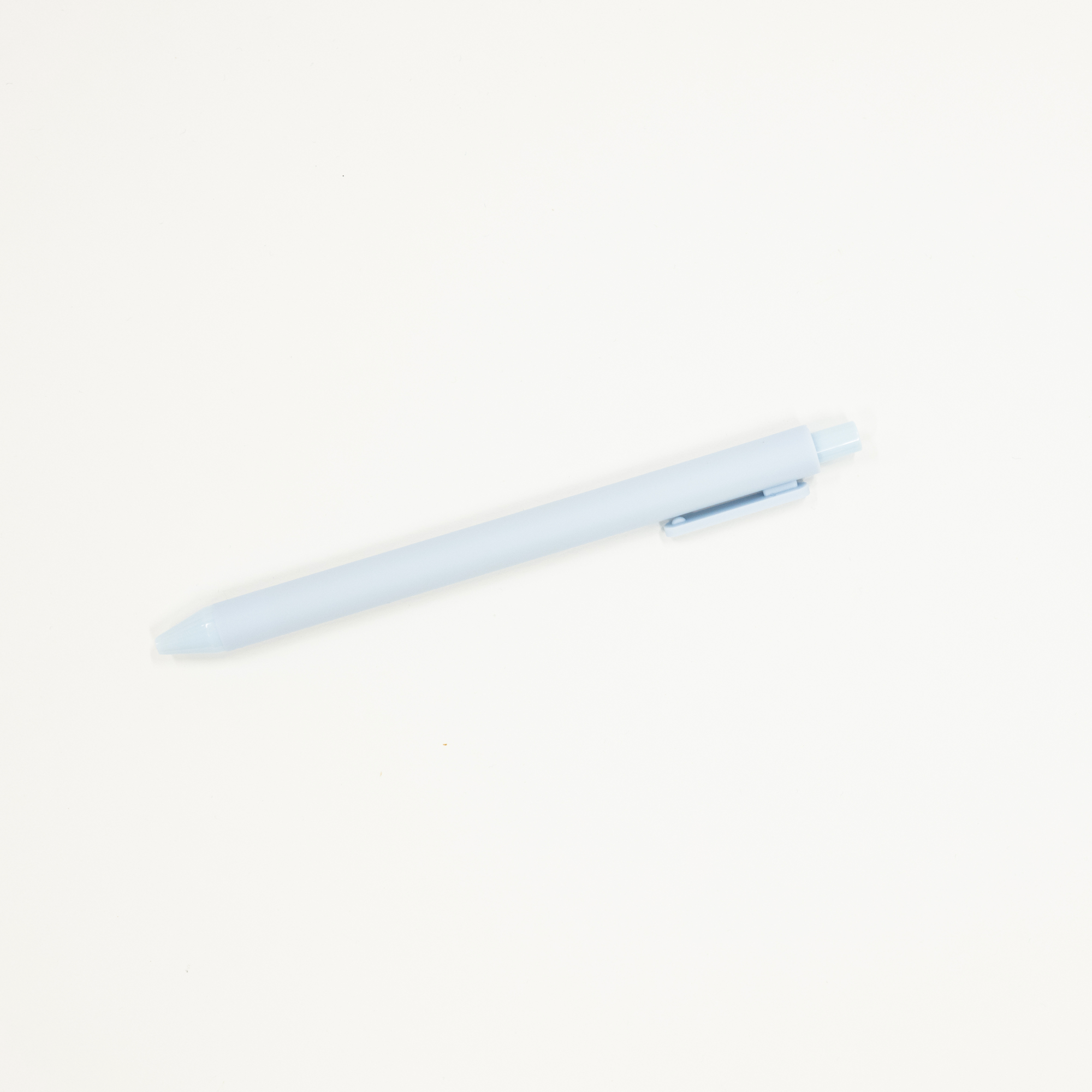 light blue pen on a white background