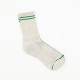 A single light heather gray crew sock with two green stripes near the cuff and a green stripe on the toe, shown on a plain white background.