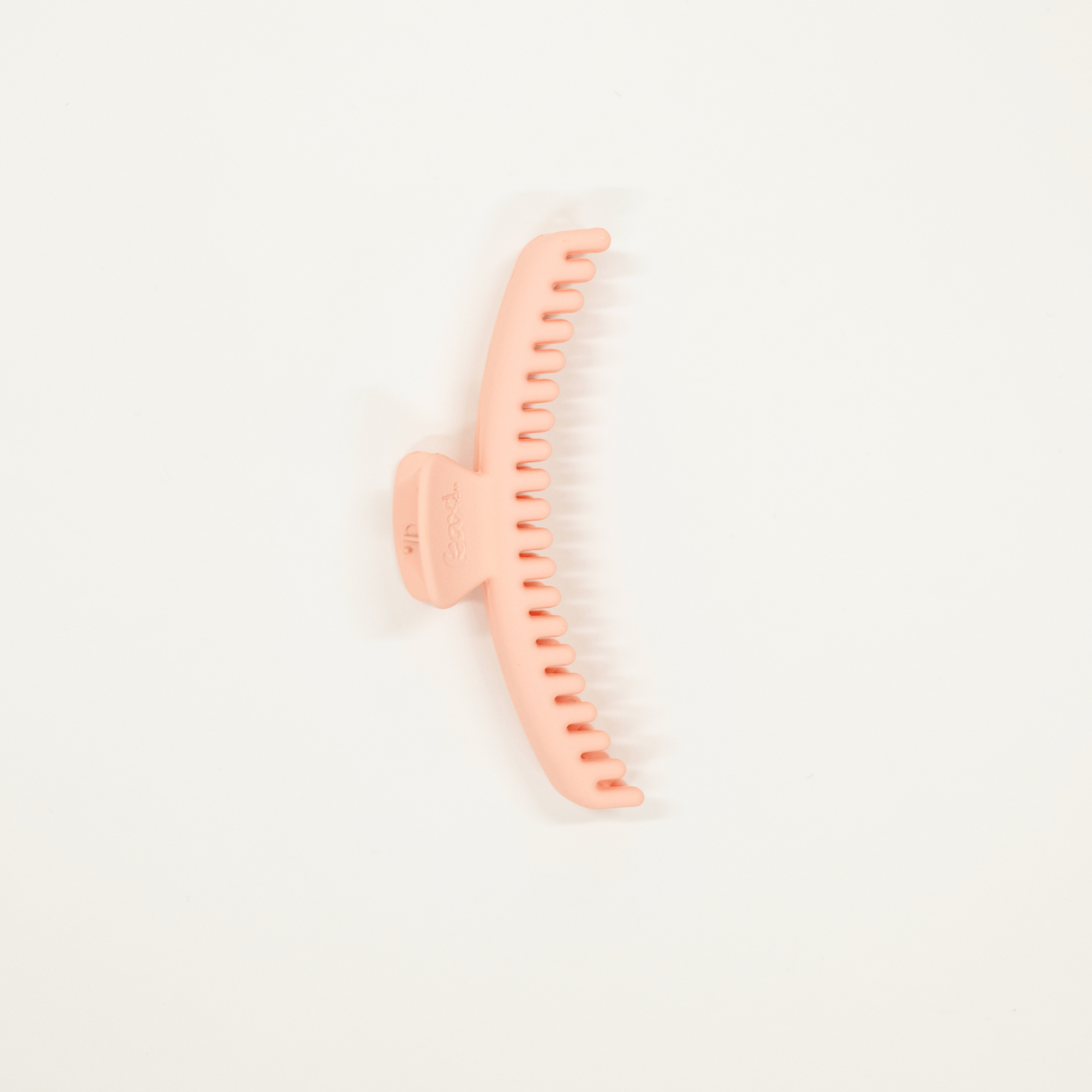 pink matte colored midi sized kaxi hold everything hair claw