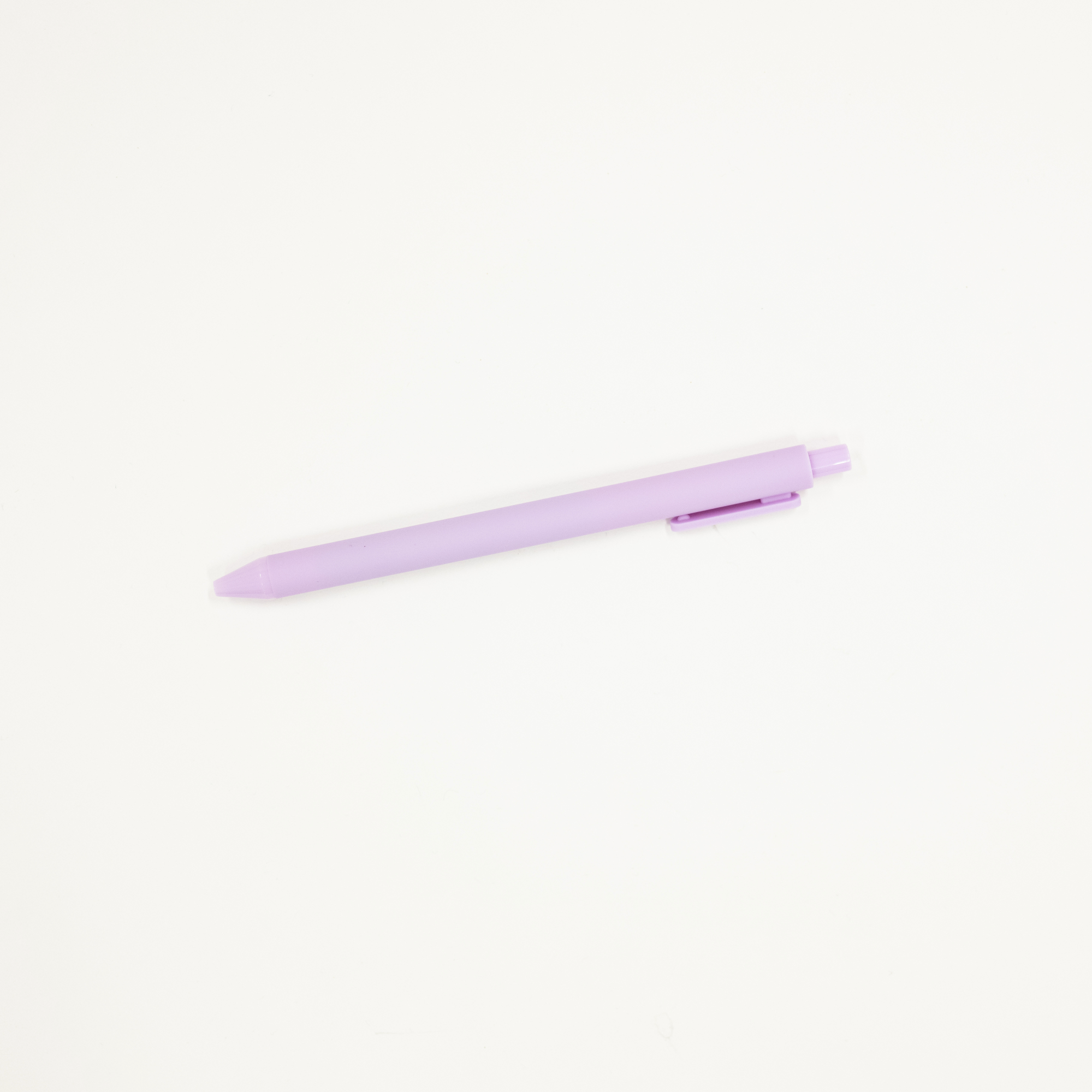 Purple pen on a white background