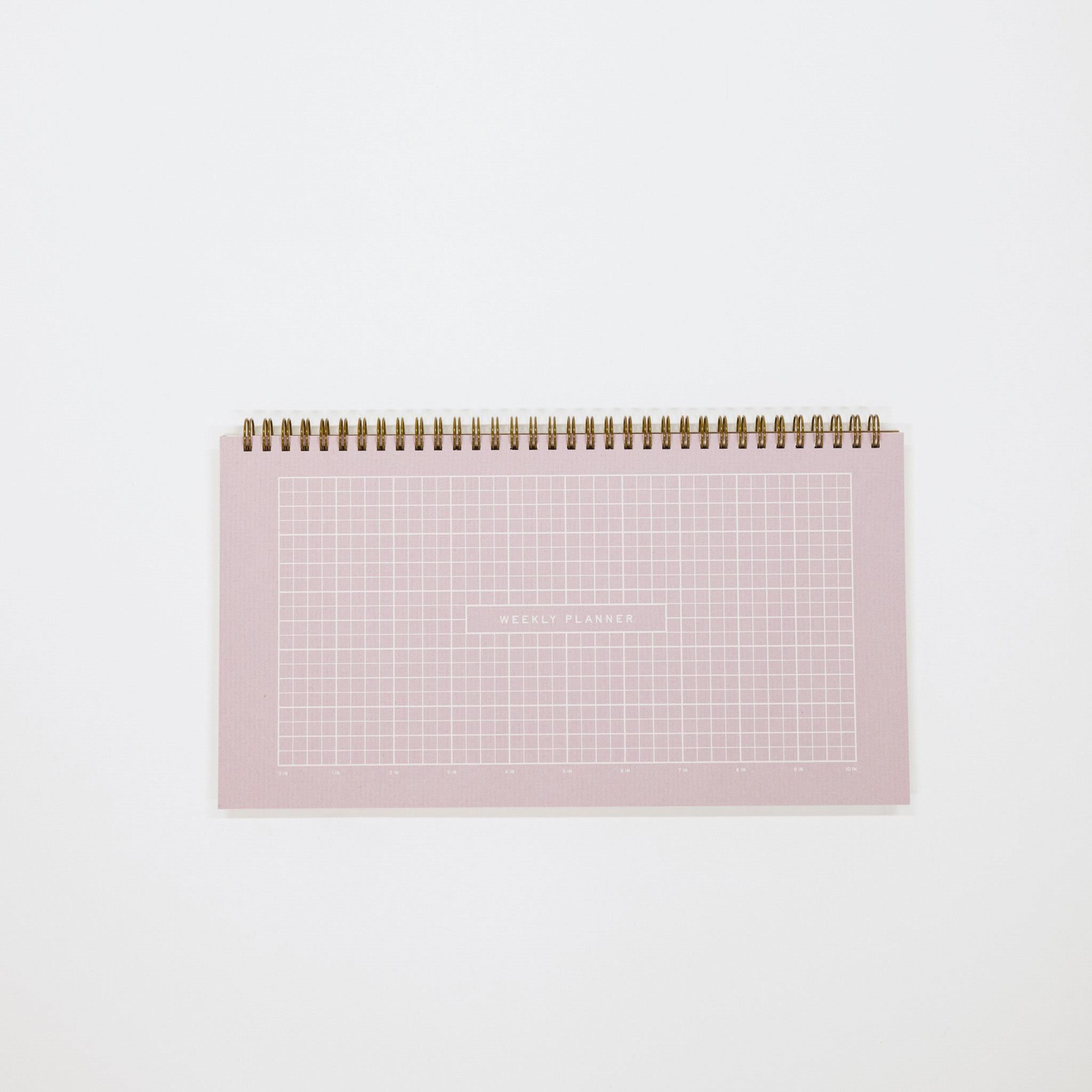 Lilac desk calendar with grid on a white background