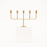 golden candelabra with five linear arms