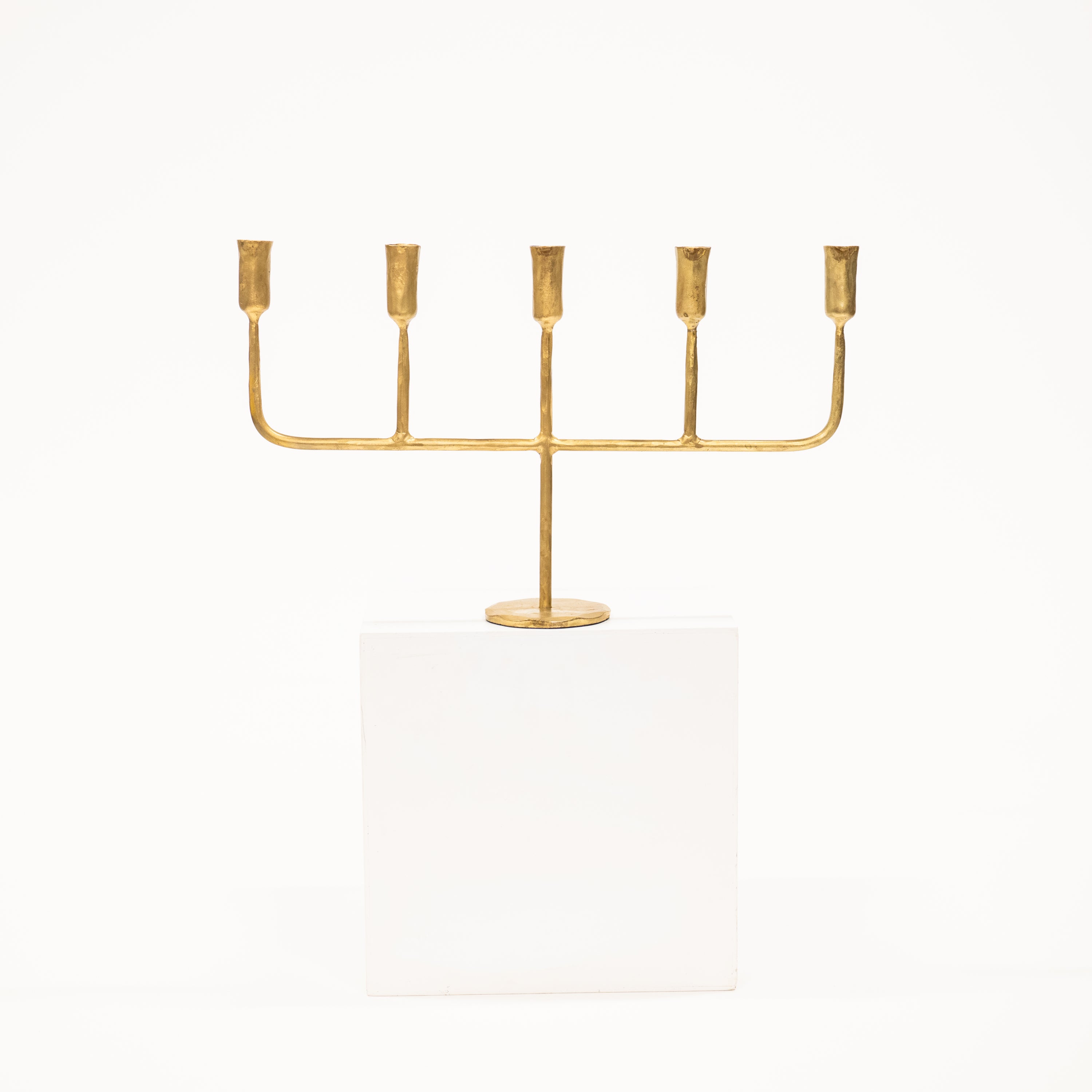 golden candelabra with five linear arms