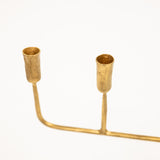 golden candelabra with five linear arms