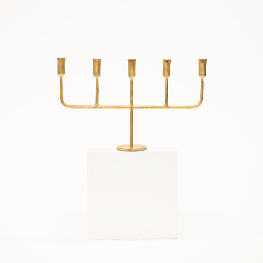golden candelabra with five linear arms