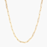 Gold chain necklace on a white background