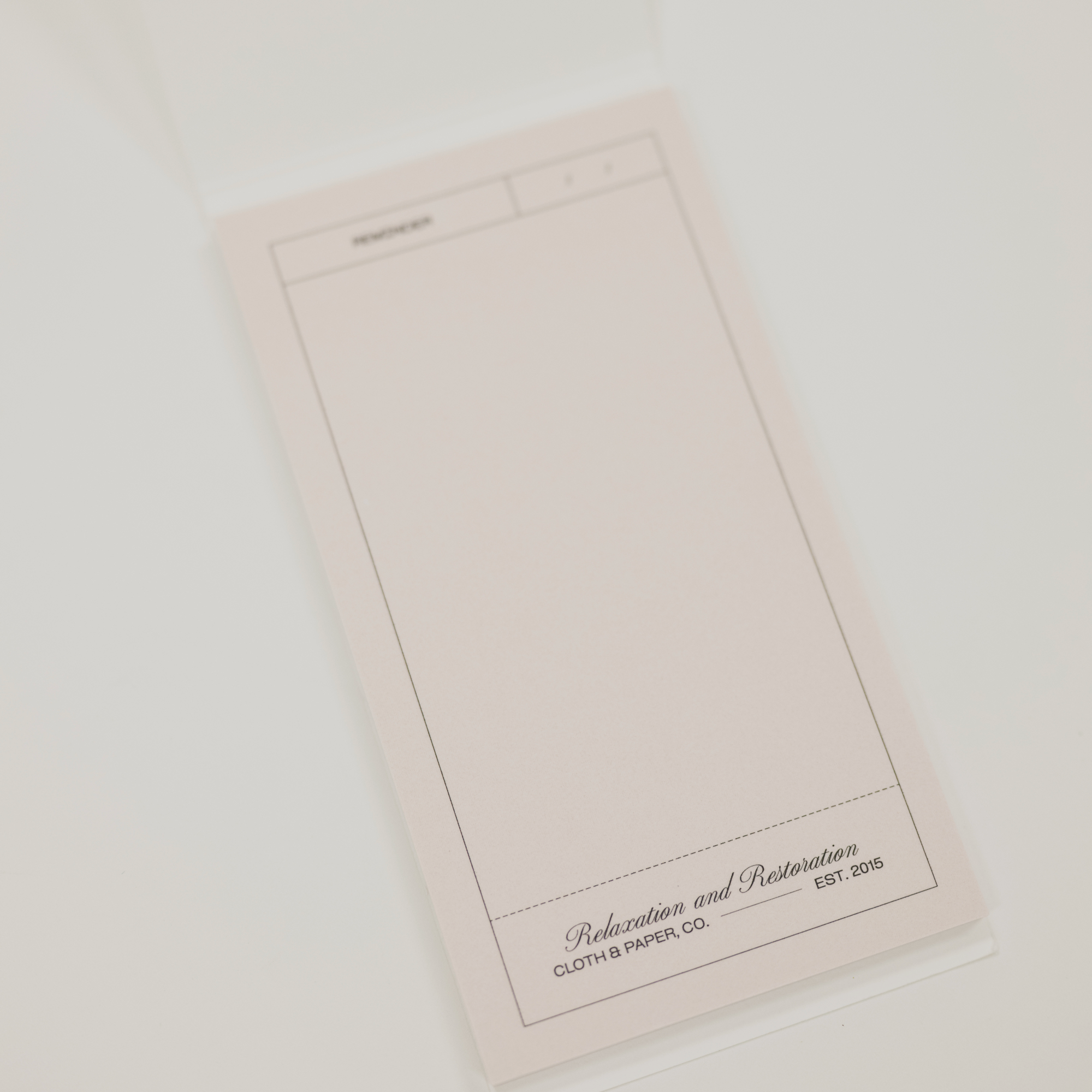 beige pink sticky note pad for writing reminders