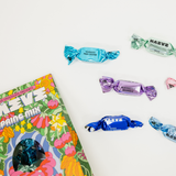 Colorful candy packaging with 'Maeve' branding on a white background