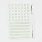 Sheet of green raised stickers with text on a white background