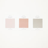 Three sticky notes in different colors on a white background