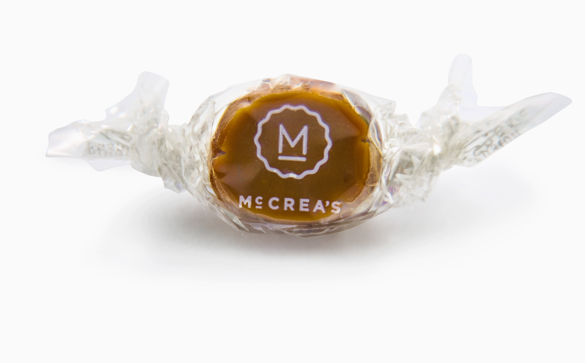Caramel candy with McCrea's logo on a white background