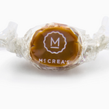 Caramel candy with McCrea's logo on a white background