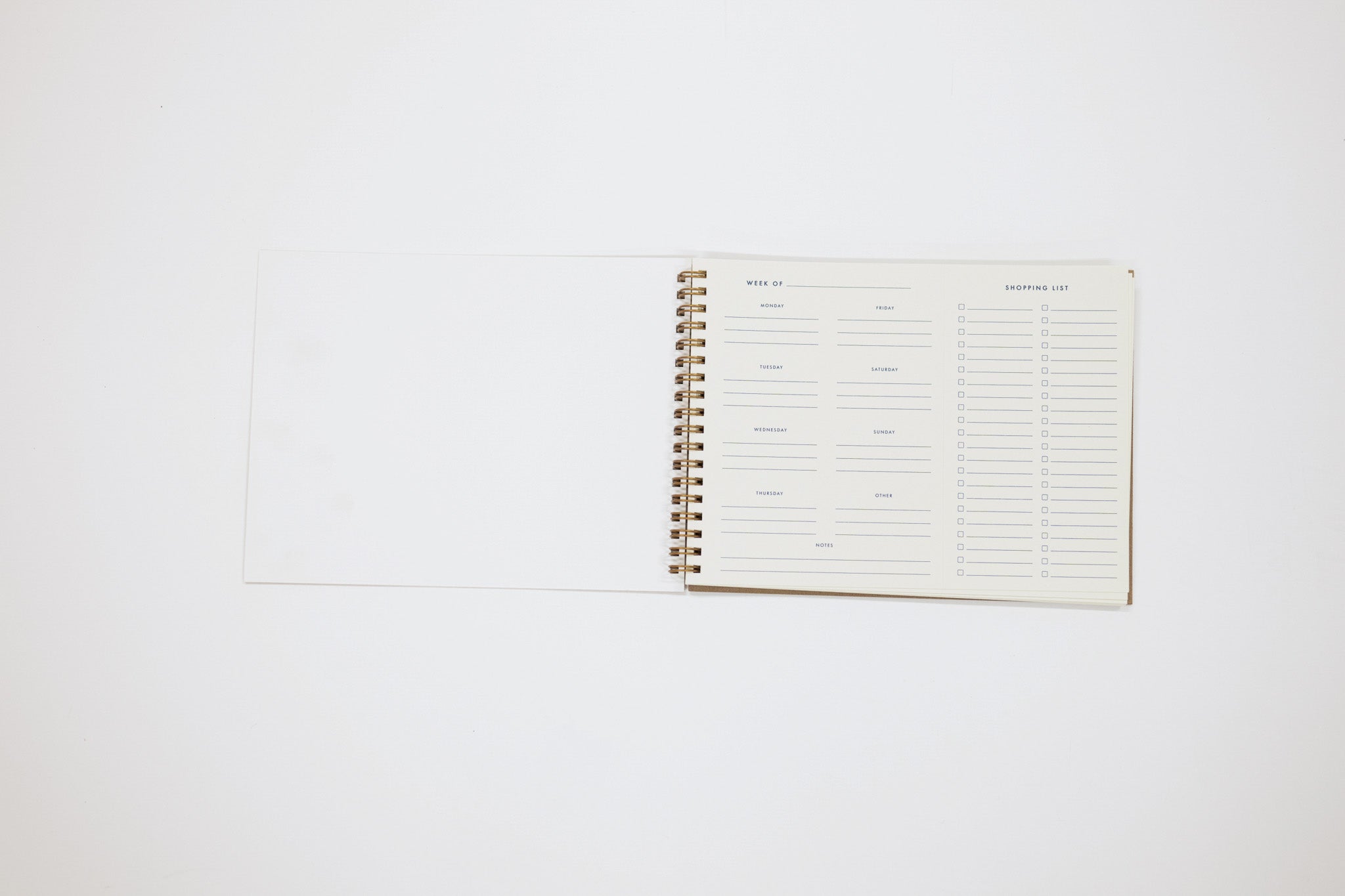 Spiral-bound planner on a white background