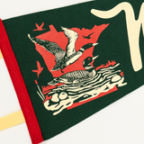 Fabric banner with duck design and text on a white background