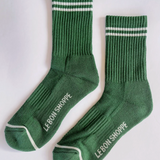 moss green boyfriend crew socks with white stripes. from the brand le bon shoppe