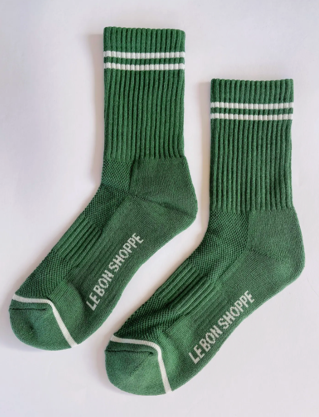 moss green boyfriend crew socks with white stripes. from the brand le bon shoppe
