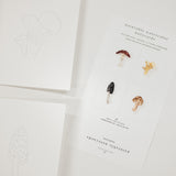 Set of 8 watercolor paintable notecards with envelopes. Feature mushroom patterns.