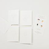 Set of 8 watercolor paintable notecards with envelopes. Feature mushroom patterns.