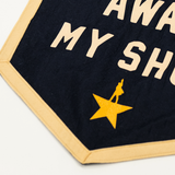 detail shot of felt banner with "i'm not throwing away my shot" quote from hamilton