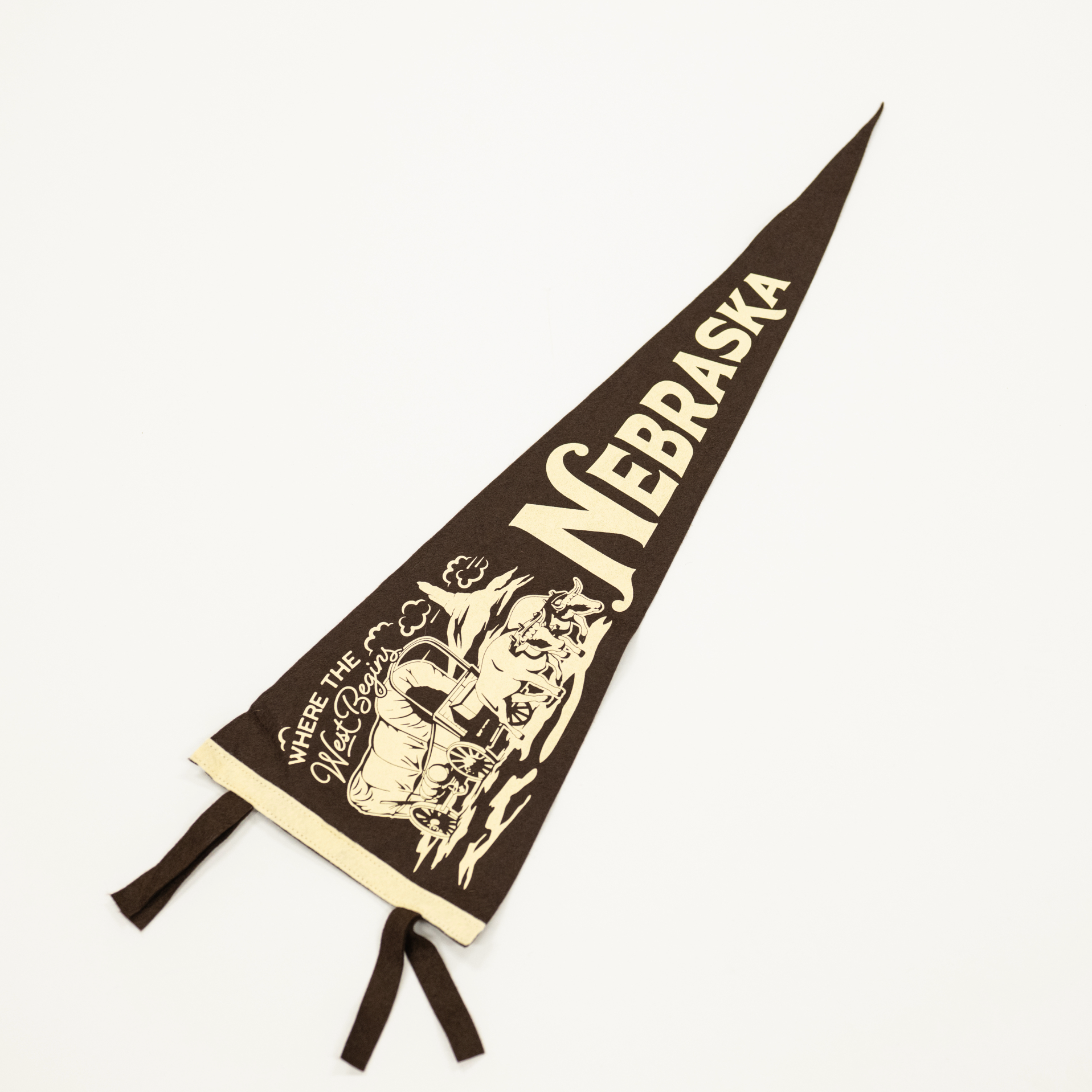 Nebraska-themed pennant with logo and text on a white background