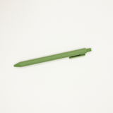 Green pen on a white background