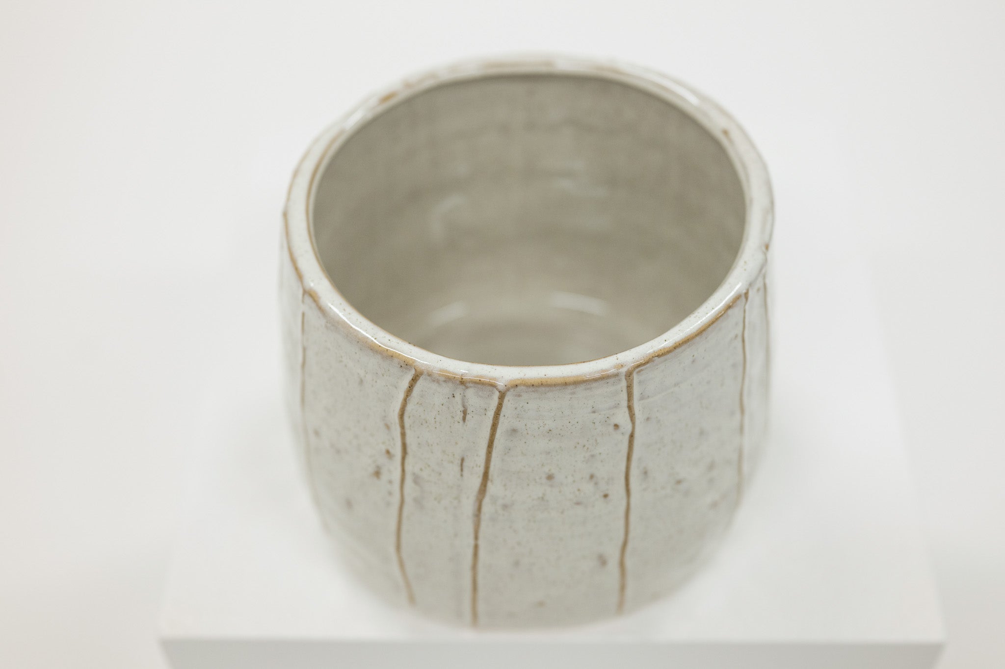 Ceramic cup with a unique design on a white background