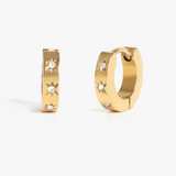 Gold hoop earrings with small diamonds on a white background