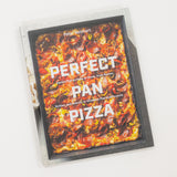 Cookbook titled 'Perfect Pan Pizza' by Peter Reinhart on a white background