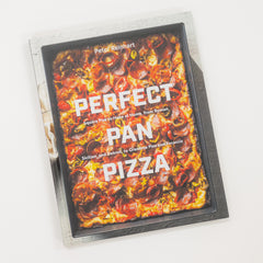 Cookbook titled 'Perfect Pan Pizza' by Peter Reinhart on a white background